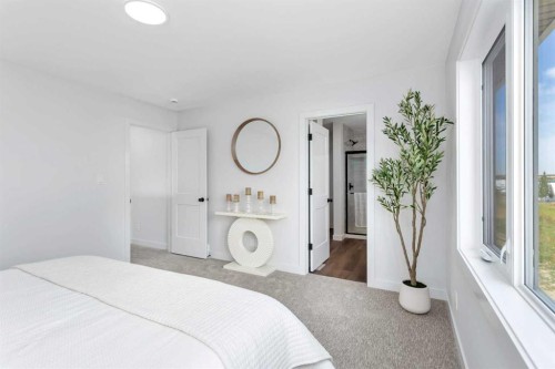 115 Hampton Crescent, Sylvan Lake, AB - Indoor Photo Showing Bedroom