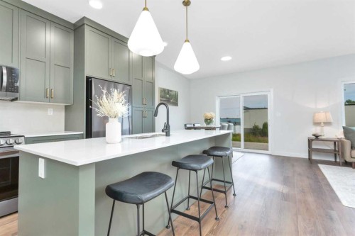 115 Hampton Crescent, Sylvan Lake, AB - Indoor Photo Showing Kitchen With Upgraded Kitchen