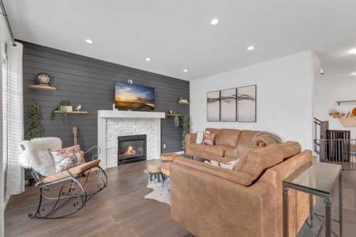 89 Connaught Crescent, Red Deer, AB - Indoor Photo Showing Living Room With Fireplace