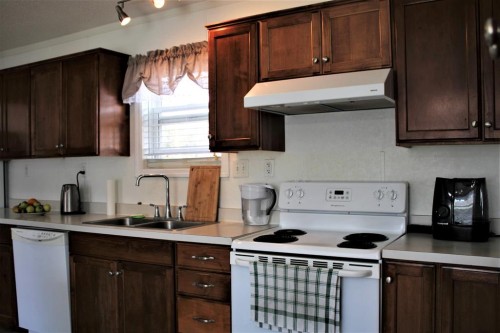 20 Noblefern Way, Sundre, AB - Indoor Photo Showing Kitchen With Double Sink