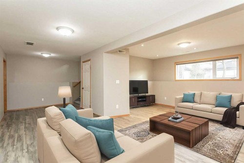 24 Lanterman Close, Red Deer, AB - Indoor Photo Showing Living Room