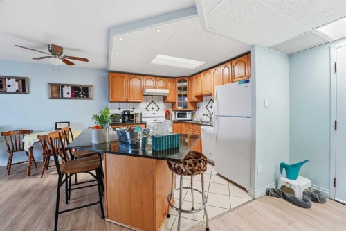 306-4902 37 Street, Red Deer, AB - Indoor Photo Showing Kitchen