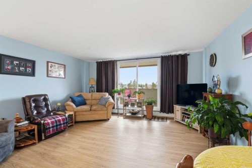 306-4902 37 Street, Red Deer, AB - Indoor Photo Showing Living Room