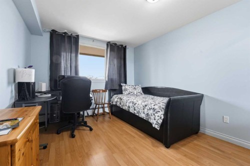 306-4902 37 Street, Red Deer, AB - Indoor Photo Showing Bedroom