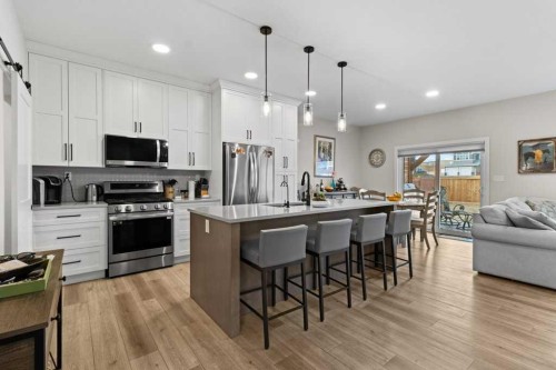 85 Crestview Boulevard, Sylvan Lake, AB - Indoor Photo Showing Kitchen With Stainless Steel Kitchen With Upgraded Kitchen