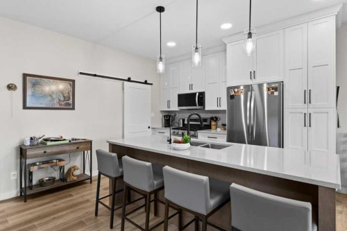 85 Crestview Boulevard, Sylvan Lake, AB - Indoor Photo Showing Kitchen With Stainless Steel Kitchen With Upgraded Kitchen