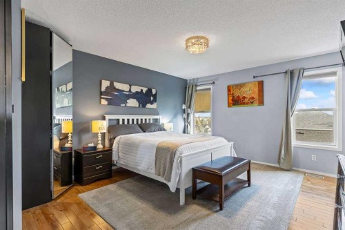 60 Bridlecreek Terrace Sw, Calgary, AB - Indoor Photo Showing Bedroom