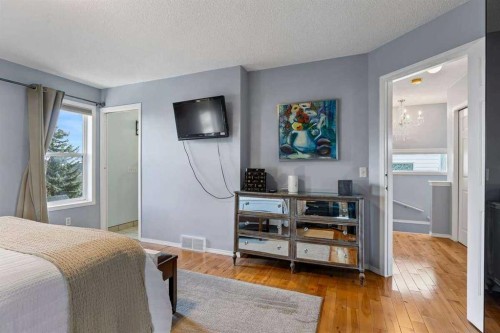 60 Bridlecreek Terrace Sw, Calgary, AB - Indoor Photo Showing Bedroom