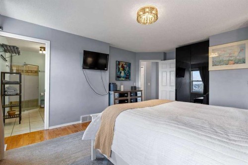 60 Bridlecreek Terrace Sw, Calgary, AB - Indoor Photo Showing Bedroom