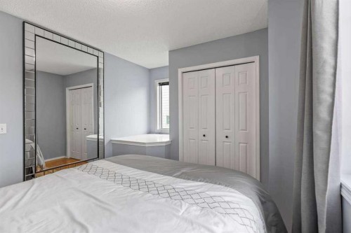 60 Bridlecreek Terrace Sw, Calgary, AB - Indoor Photo Showing Bedroom