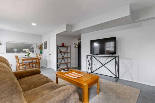 60 Bridlecreek Terrace Sw, Calgary, AB - Indoor Photo Showing Living Room