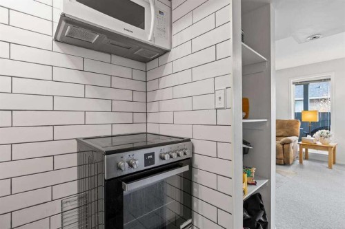 60 Bridlecreek Terrace Sw, Calgary, AB - Indoor Photo Showing Kitchen