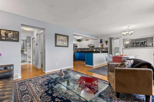 60 Bridlecreek Terrace Sw, Calgary, AB - Indoor Photo Showing Living Room