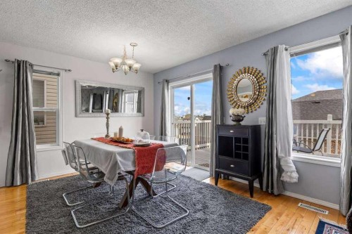 60 Bridlecreek Terrace Sw, Calgary, AB - Indoor Photo Showing Dining Room