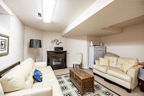 164 Dixon Crescent, Red Deer, AB - Indoor Photo Showing Living Room With Fireplace
