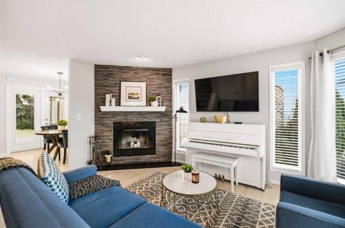164 Dixon Crescent, Red Deer, AB - Indoor Photo Showing Living Room With Fireplace
