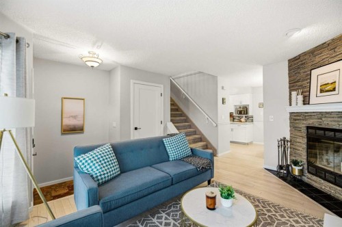 164 Dixon Crescent, Red Deer, AB - Indoor Photo Showing Living Room With Fireplace