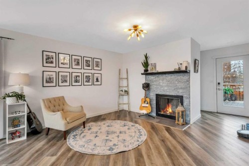 7 Westview Drive, Lacombe, AB - Indoor Photo Showing Living Room With Fireplace