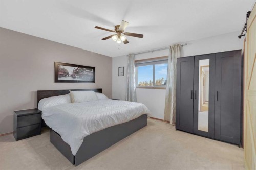 16 Parson Drive, Sylvan Lake, AB - Indoor Photo Showing Bedroom