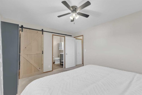 16 Parson Drive, Sylvan Lake, AB - Indoor Photo Showing Bedroom