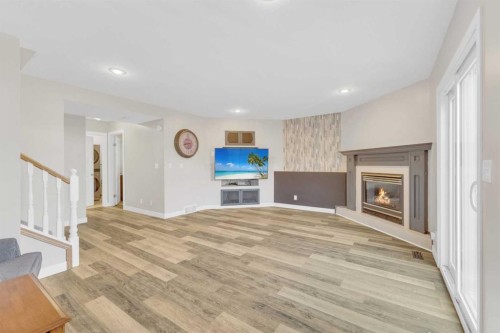 16 Parson Drive, Sylvan Lake, AB - Indoor With Fireplace