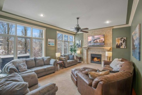10 Fieldstone Way, Sylvan Lake, AB - Indoor Photo Showing Living Room With Fireplace