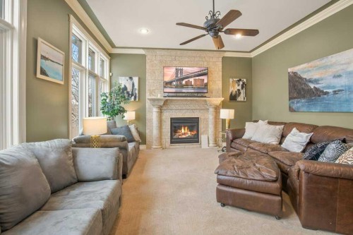 10 Fieldstone Way, Sylvan Lake, AB - Indoor Photo Showing Living Room With Fireplace