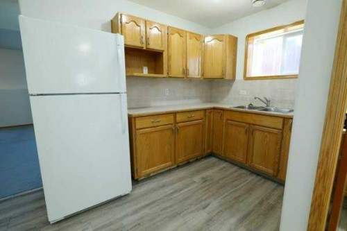 34 Kirkland Close, Red Deer, AB - Indoor Photo Showing Kitchen With Double Sink