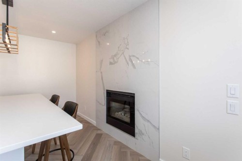 10 Pickwick Lane, Lacombe, AB - Indoor With Fireplace