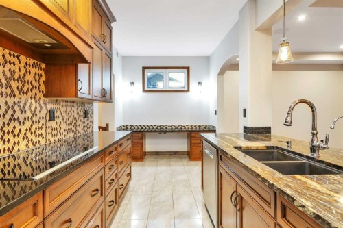 100 Van Slyke Way, Red Deer, AB - Indoor Photo Showing Kitchen With Double Sink