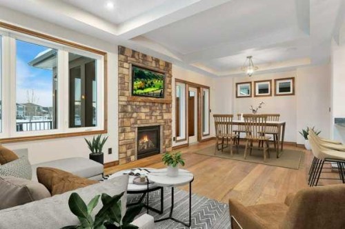 100 Van Slyke Way, Red Deer, AB - Indoor Photo Showing Living Room With Fireplace