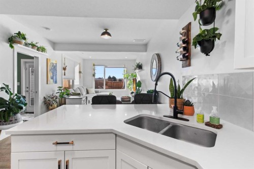 4070 Ryders Ridge Boulevard, Sylvan Lake, AB - Indoor Photo Showing Kitchen With Double Sink