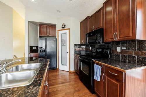 86 Jenner Crescent, Red Deer, AB - Indoor Photo Showing Kitchen With Double Sink