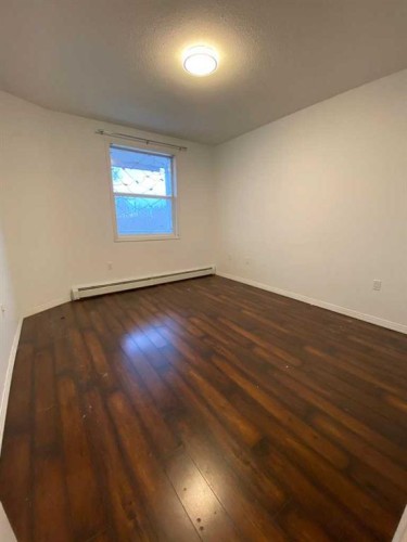 202-5211 39 Street, Red Deer, AB - Indoor Photo Showing Other Room