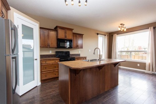 152 Oswald Close, Red Deer, AB - Indoor Photo Showing Kitchen With Double Sink