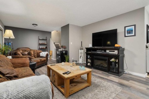 3803 63 Street, Camrose, AB - Indoor Photo Showing Living Room With Fireplace