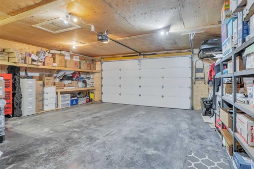 98 Village Crescent, Red Deer, AB - Indoor Photo Showing Garage