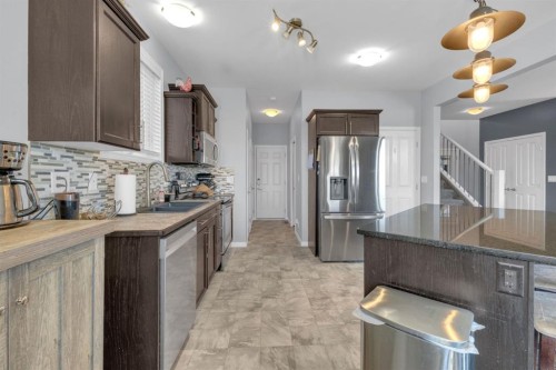 38 Rolling Hills Bay, Blackfalds, AB - Indoor Photo Showing Kitchen With Upgraded Kitchen