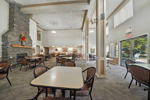 229-56 Carroll Crescent, Red Deer, AB - Indoor With Fireplace
