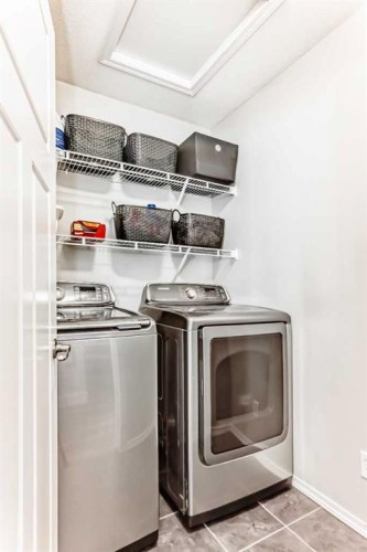 37 Heartland Crescent, Penhold, AB - Indoor Photo Showing Laundry Room