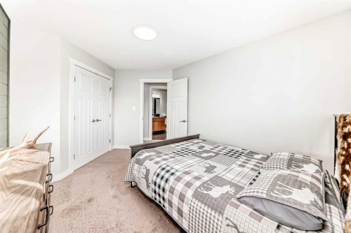37 Heartland Crescent, Penhold, AB - Indoor Photo Showing Bedroom