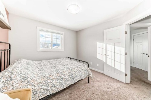 37 Heartland Crescent, Penhold, AB - Indoor Photo Showing Bedroom
