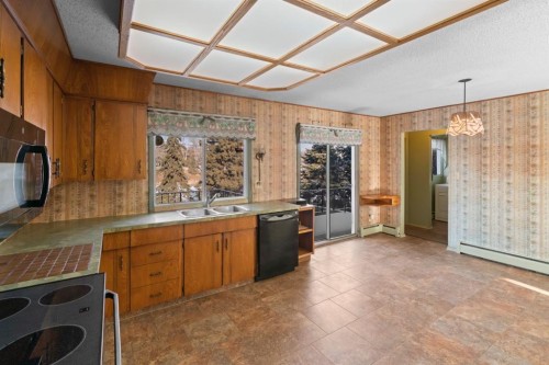 5714 48B Avenue, Camrose, AB - Indoor Photo Showing Kitchen With Double Sink