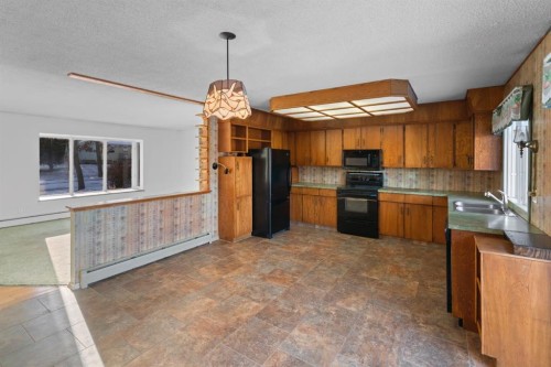5714 48B Avenue, Camrose, AB - Indoor Photo Showing Kitchen With Double Sink