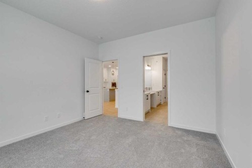 75 Fireside Common, Cochrane, AB - Indoor Photo Showing Other Room