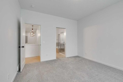 75 Fireside Common, Cochrane, AB - Indoor Photo Showing Other Room