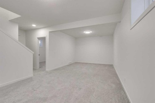 75 Fireside Common, Cochrane, AB - Indoor Photo Showing Other Room