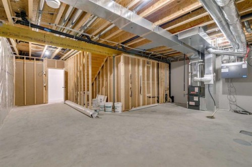75 Fireside Common, Cochrane, AB - Indoor Photo Showing Basement