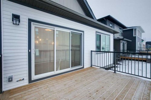 75 Fireside Common, Cochrane, AB - Outdoor With Deck Patio Veranda With Exterior