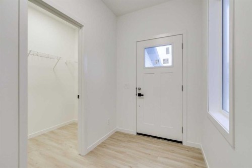 75 Fireside Common, Cochrane, AB - Indoor Photo Showing Other Room